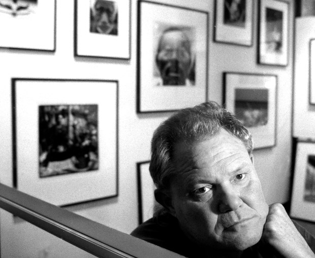 Ron "R.R." Jones photographed in his Sash Mill studio in when he was honored with a Gail Rich Award in 2001. (Shmuel Thaler Santa Cruz Sentinel file)
