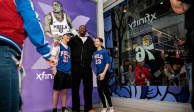 Tyrese Maxey posed with fans during meet-and-greet at the NBA Tip-Off fan celebration at the Xfinity store on Walnut Street in Philadelphia.