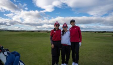 Penn women's golfers Maggie Ni, Madeleine Zang, and Chelsea Nguyen stop for a photo at the St. Andrews Links Collegiate.