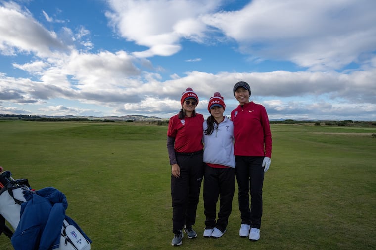 Penn women's golfers Maggie Ni, Madeleine Zang, and Chelsea Nguyen stop for a photo at the St. Andrews Links Collegiate.