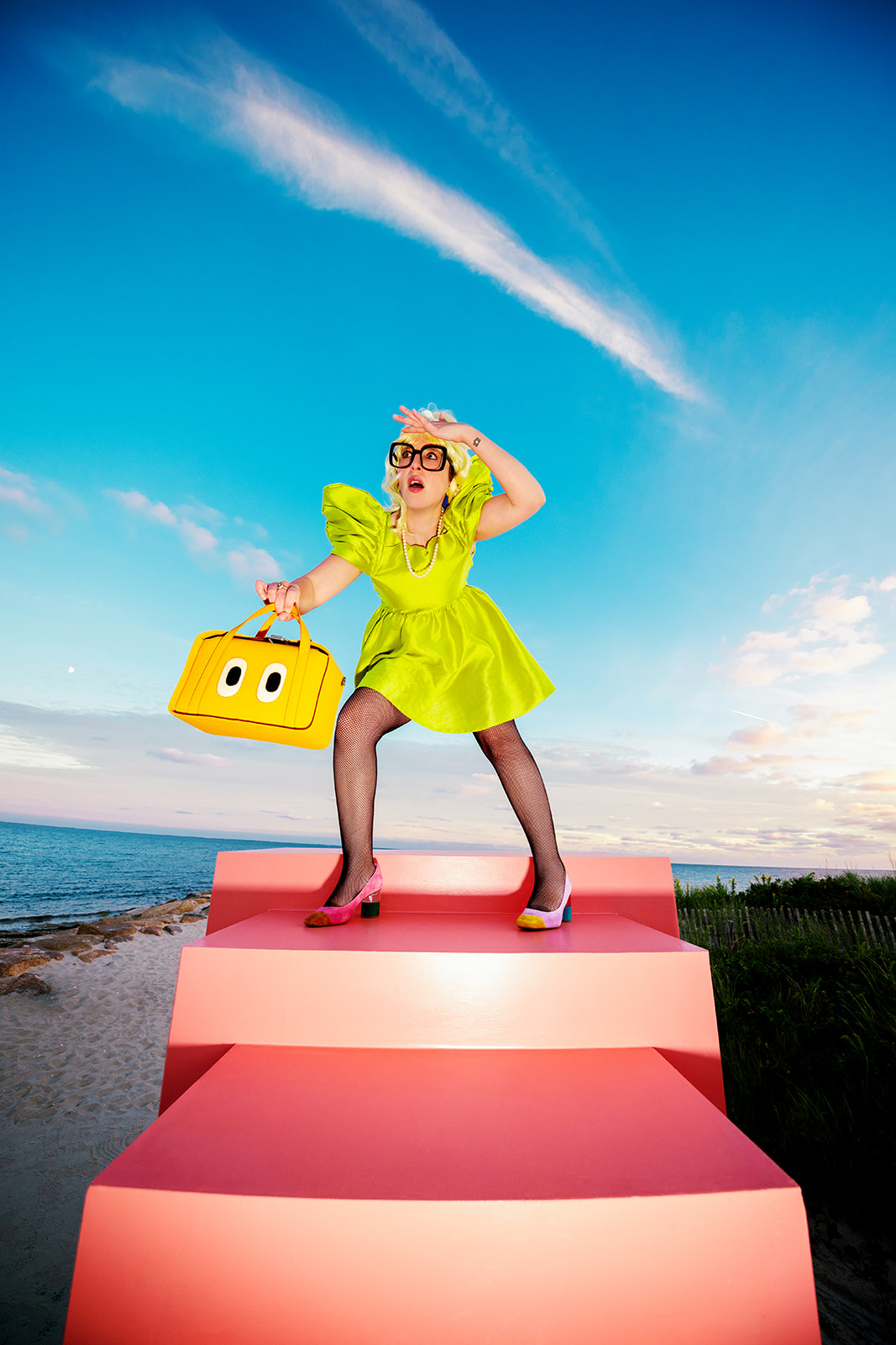 A photo from Jada and David that mixes a warped wormhole set with Cape Cod as the background