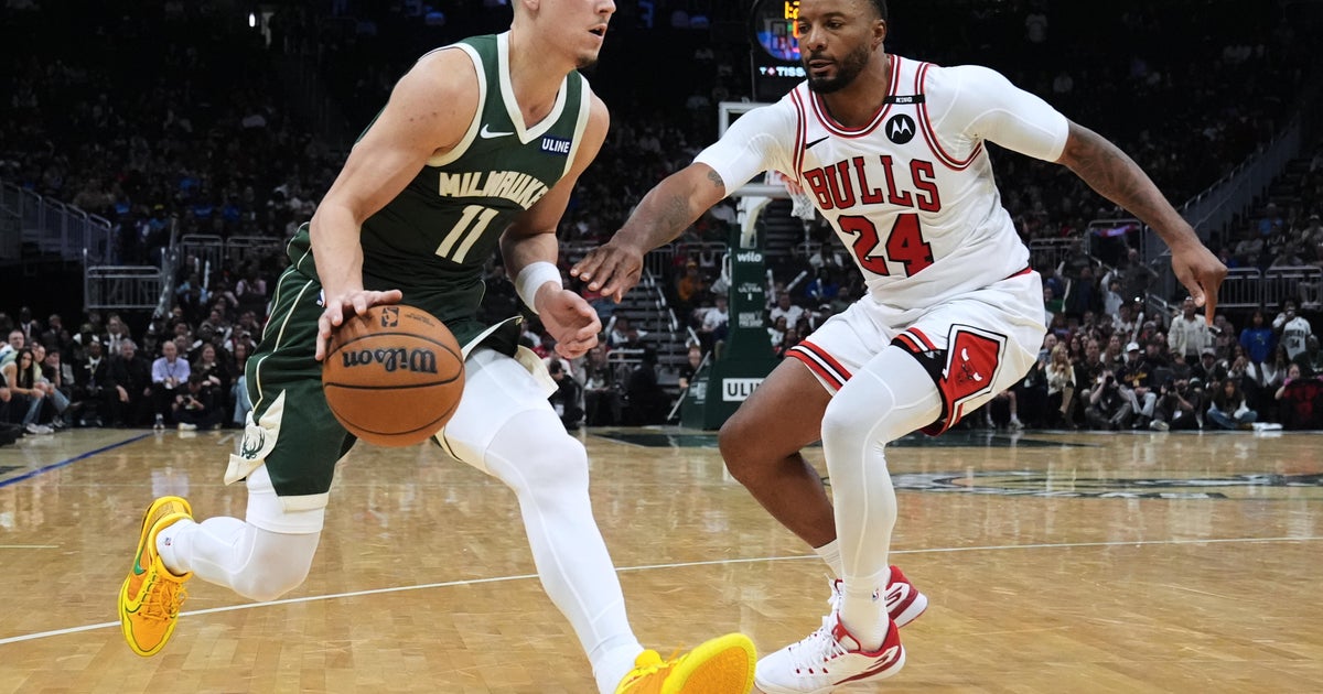 Powell scores 25 points to help the Bulls hold off the Bucks, 132-125