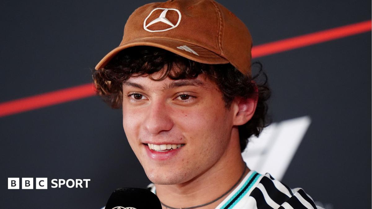 Kimi Antonelli smiling in an official news conference at the United States Grand Prix