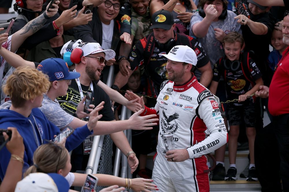 Chase Briscoe celebrates with the fans, Joe Gibbs Racing Toyota