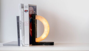hollowed quartzite and steel form concav book, a magnetic bookend luminaire