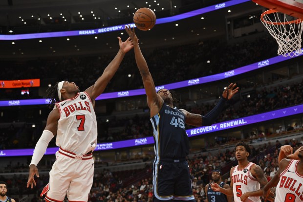 Memphis Grizzlies' GG Jackson II battles Chicago Bulls' Buddy Hield for a rebound during the first half of a preseason game Friday, Oct. 9, 2026, in Chicago. (AP Photo/Paul Beaty)