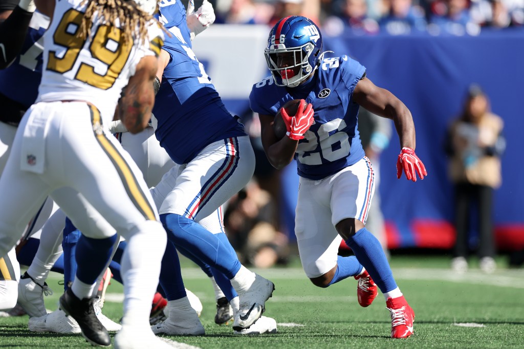 Devin Singletary of the New York Giants carries the ball against the New Orleans Saints.