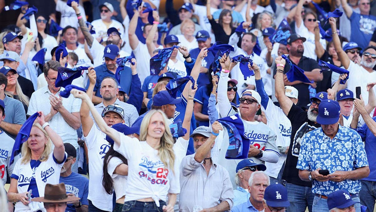 Fans cheer before Game 3 of the National League Championship Series at Dodger Stadium.