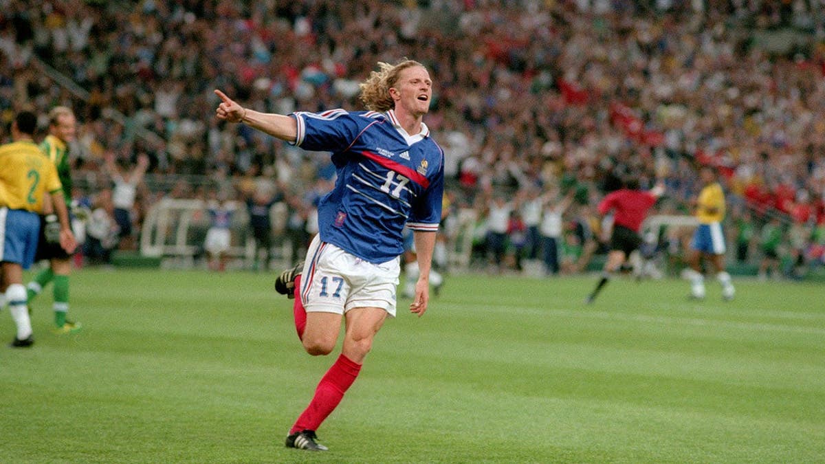 Emmanuel Petit celebrates after scoring during the 1998 FIFA World Cup.