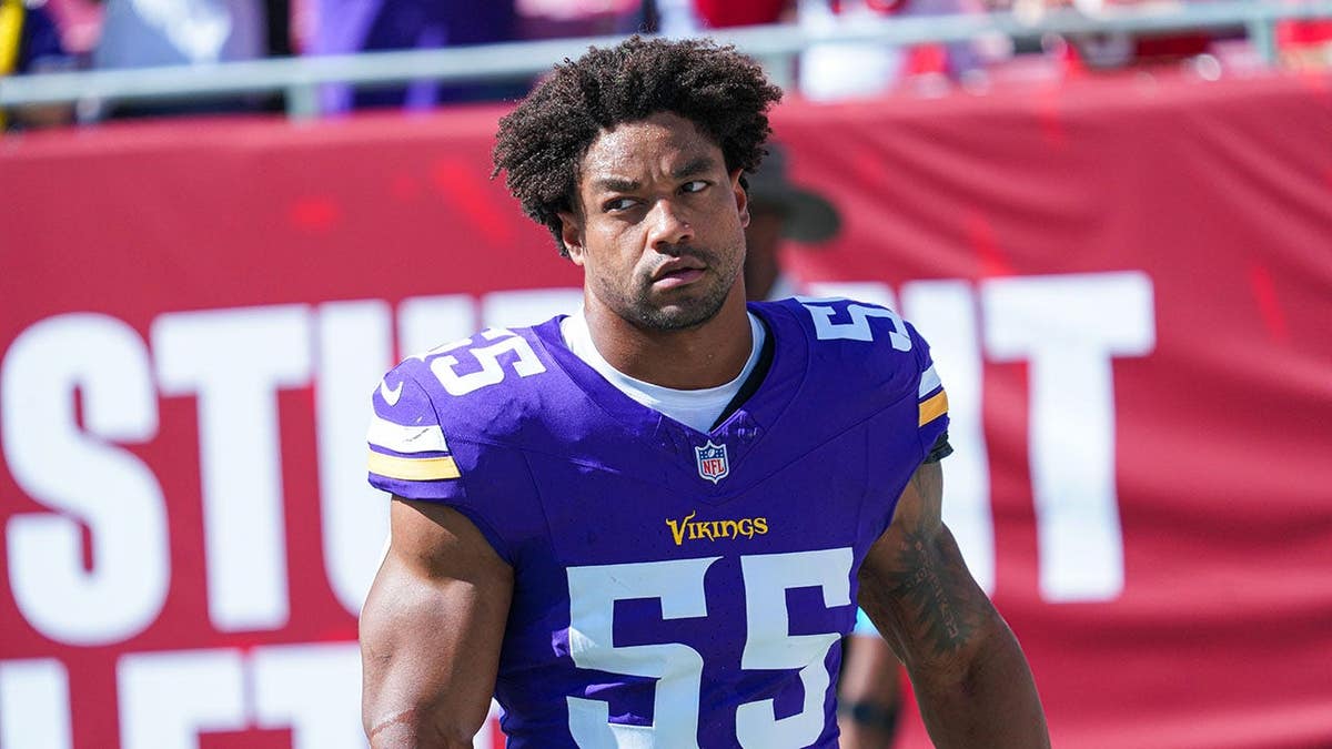 Eric Wilson, Minnesota Vikings player #55, stands at Raymond James Stadium.