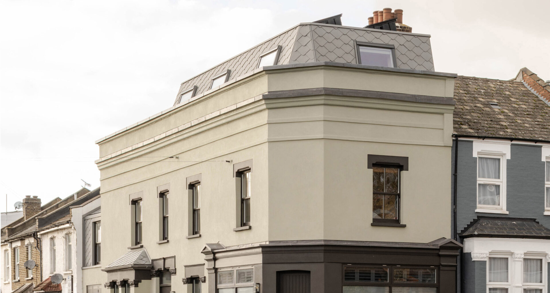 Fieldwork turns dilapidated building into mansard-roof-topped home