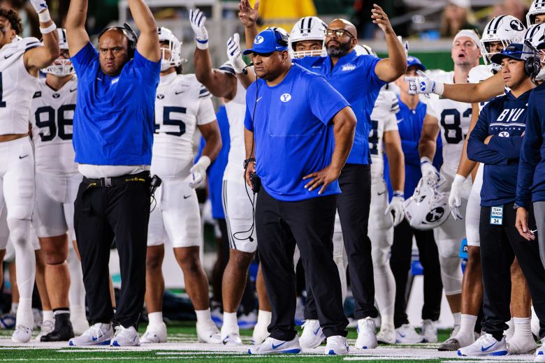 Head coach Kalani Sitake of the BYU Cougars looks on from the sideline in a game earlier this year.