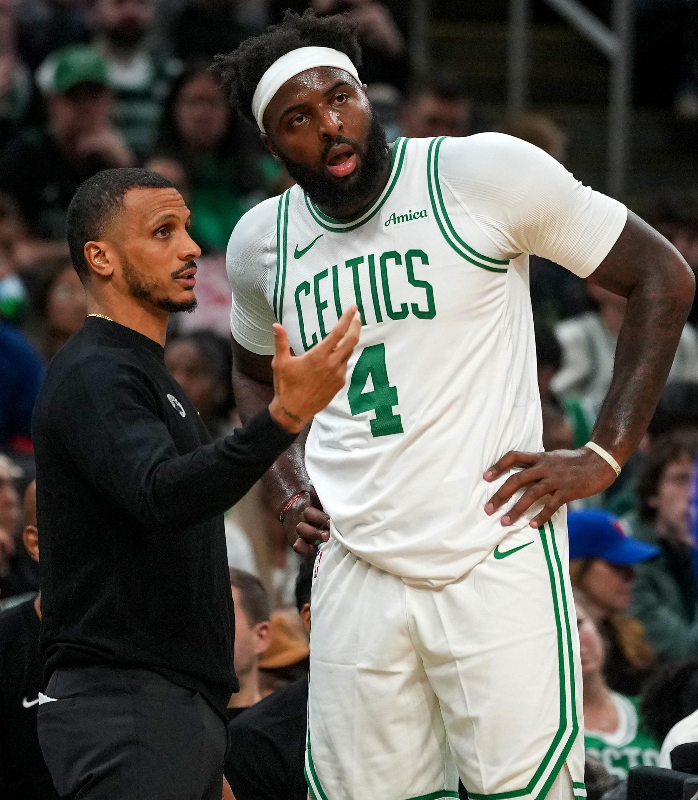 Boston, MA - October 10: Boston Celtics Head Coach Joe Mazzulla talks to Boston Celtics center Mitchell Robinson in the second quarter. The Boston Celtics played the Philadelphia 76ers in a preseason game at TD Garden on October 10, 2026. (Photo by Barry Chin/The Boston Globe via Getty Images)