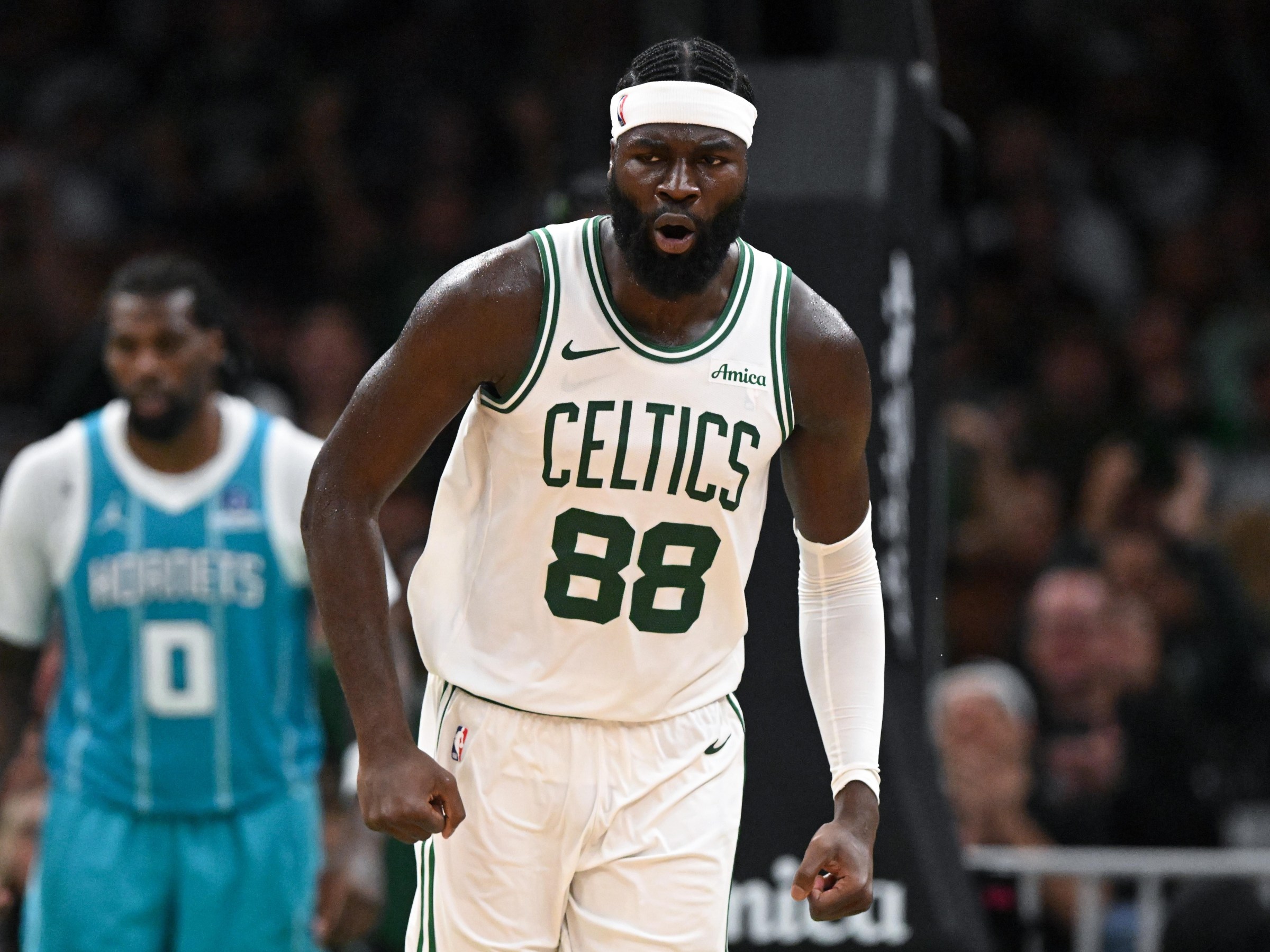 BOSTON, MASSACHUSETTS - OCTOBER 14: Neemias Queta #88 of the Boston Celtics reacts after scoring a basket against the Charlotte Hornets during the second half of the preseason game at the TD Garden on October 14, 2026 in Boston, Massachusetts. NOTE TO USER: User expressly acknowledges and agrees that, by downloading and or using this photograph, User is consenting to the terms and conditions of the Getty Images License Agreement. (Photo by Brian Fluharty/Getty Images)