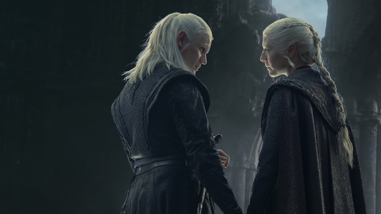Rhaenyra and Daemon Targaryen share a knowing look with one another