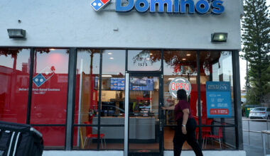 Earnings live updates: Domino's Pizza stock falls amid tough consumer backdrop