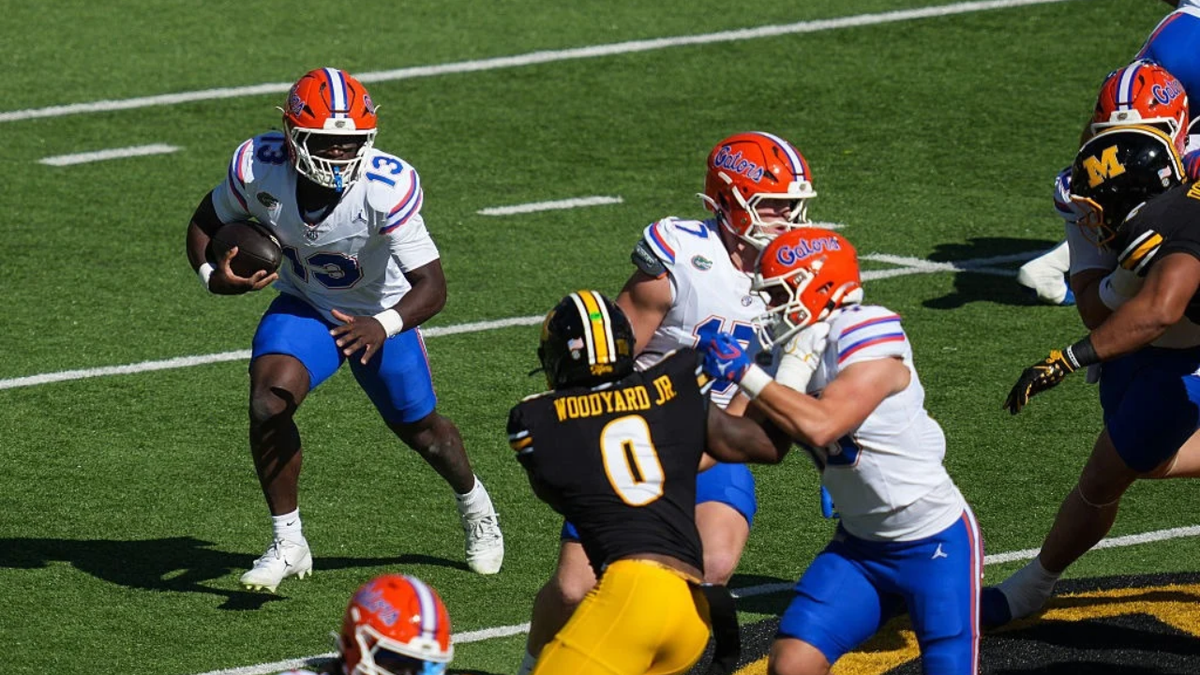 Jadan Baugh runs with the ball against Missouri at Faurot Field.