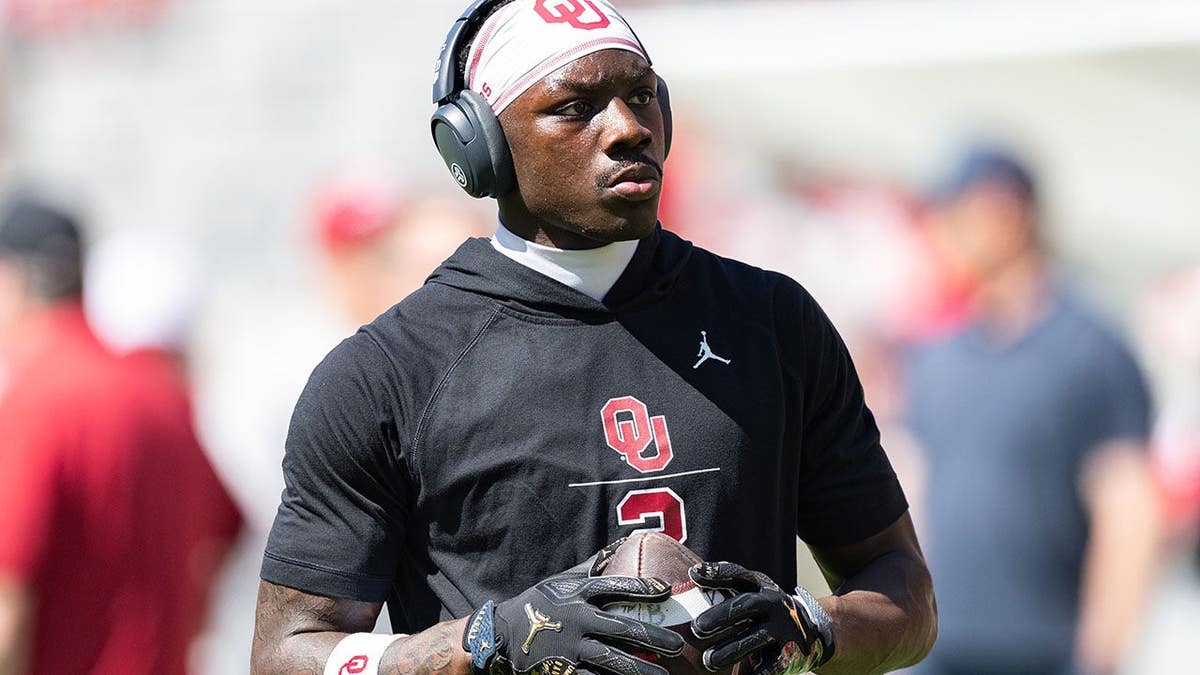 Jahsiear Rogers, No. 2, warms up before a game at Sanford Stadium.