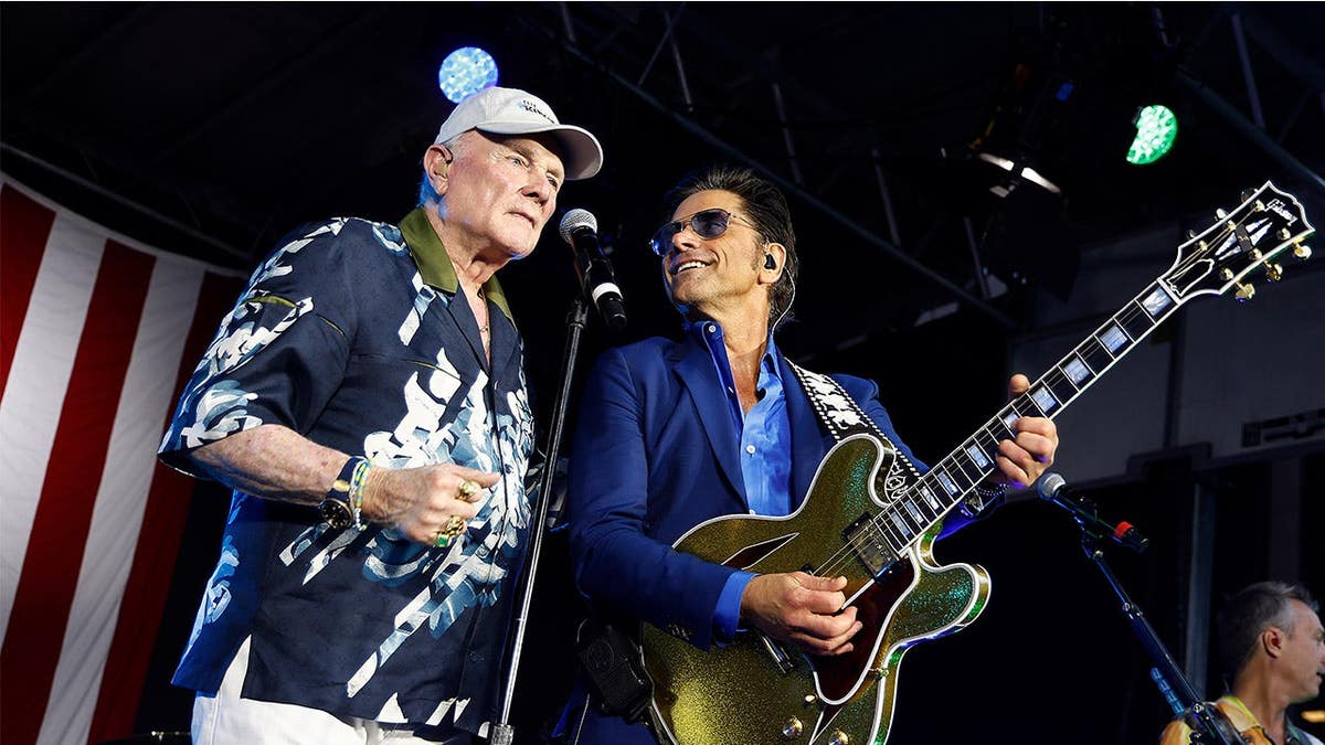 Mike Love, John Stamos on stage