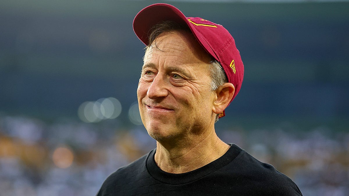 Owner Josh Harris of the Washington Commanders looks on prior to the game against the Green Bay Packers at Lambeau Field on Sept. 11, 2025 in Green Bay, Wisconsin.
