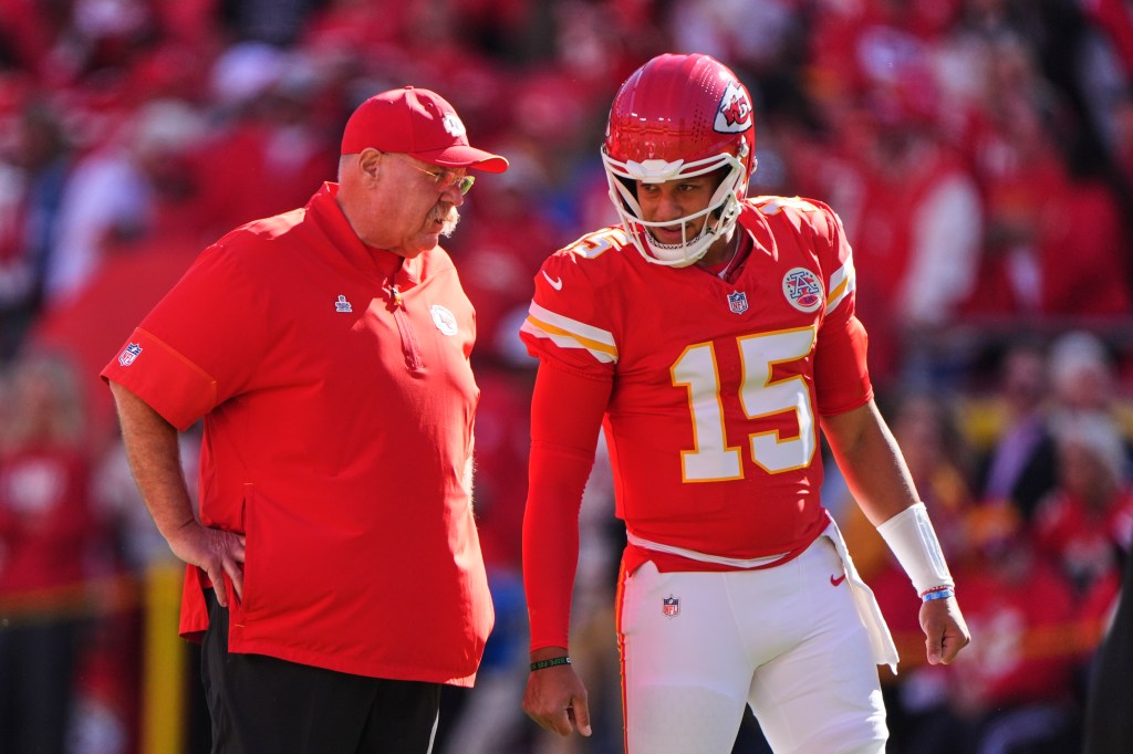 Kansas City Chiefs head coach Andy Reid talks with quarterback Patrick Mahomes during warmups.
