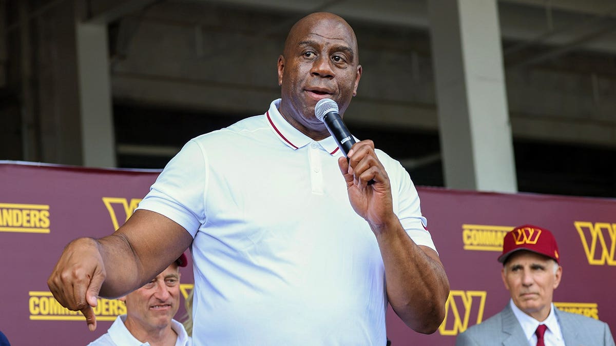 Magic Johnson speaks at a podium during a press conference in Landover, Maryland.