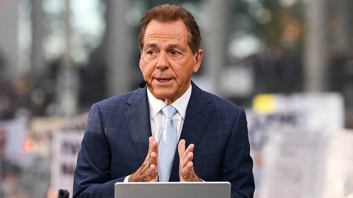 Nick Saban on a TV set