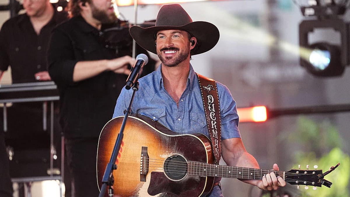 Riley Green performs on stage at Rockefeller Plaza in New York City.