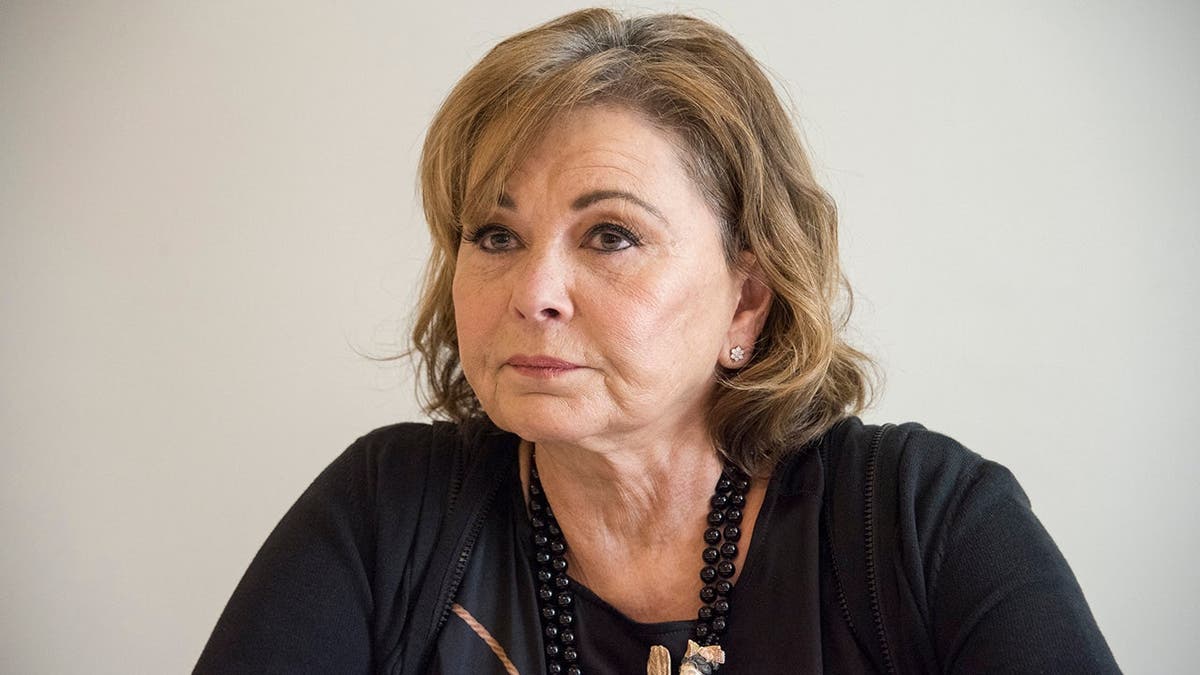 Roseanne Barr stands at a press conference in Beverly Hills, Calif.