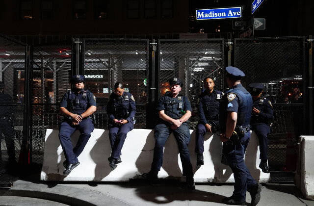 New York City police officers are on duty outside the Lotte Palace Hotel during a United Nations General Assembly leaders reception, late Tuesday, Sept. 22, 2026, in New York. (AP Photo/Julia Demaree Nikhinson)