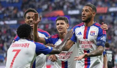 Lyon's Corentin Tolisso, second right, is congratulated by teammates after scoring the opening goal against Crystal Palace
