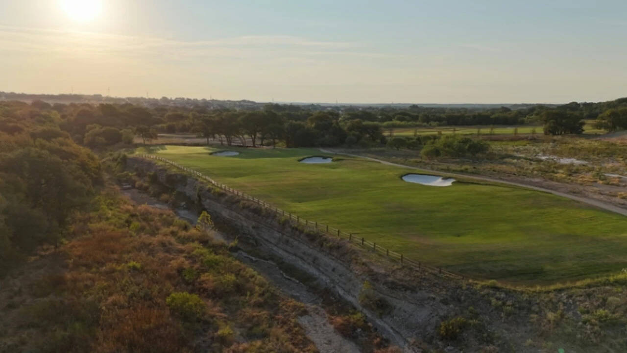 The community will have an 18-hole course and a shorter 10-hole course. The community will have an 18-hole course and a shorter 10-hole course.