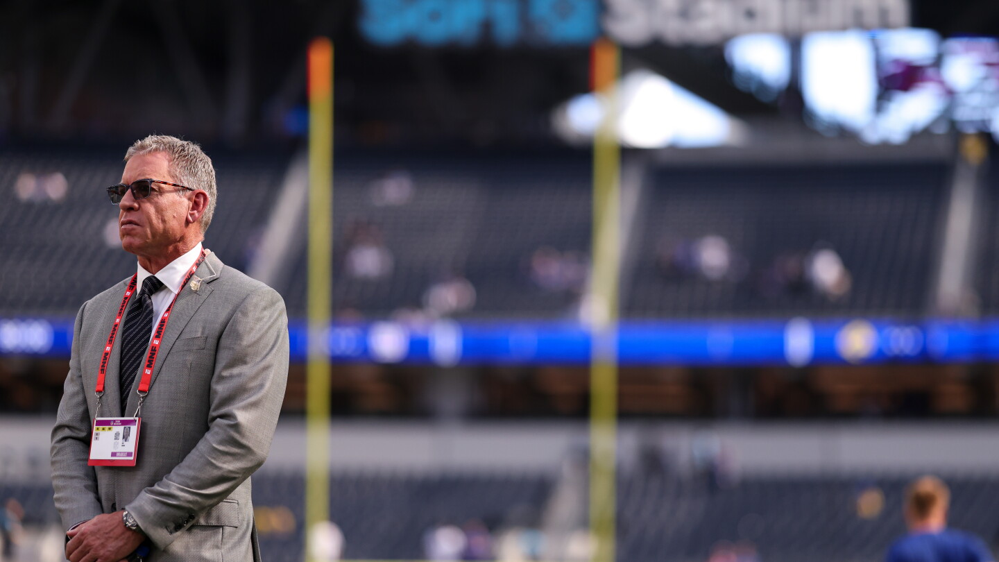 Troy Aikman's role with the Dolphins hovers over his broadcasting future