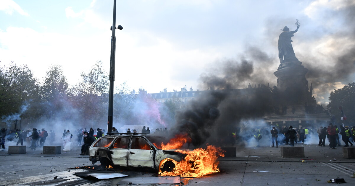 Scuffles and fires break out as protesters rally across France, joining students