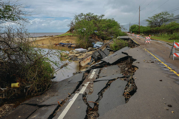 MARCO GARCIA / SPECIAL TO THE STAR-ADVERTISER Hawaii endured several natural disasters in a short period this year. Overturned vehicles and other debris lies amid the collapse of a portion of Farrington Highway near Keaau Beach during the Kona Low storm on March 23.