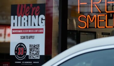 Americans filing for jobless aid remain at historically low levels below 200,000