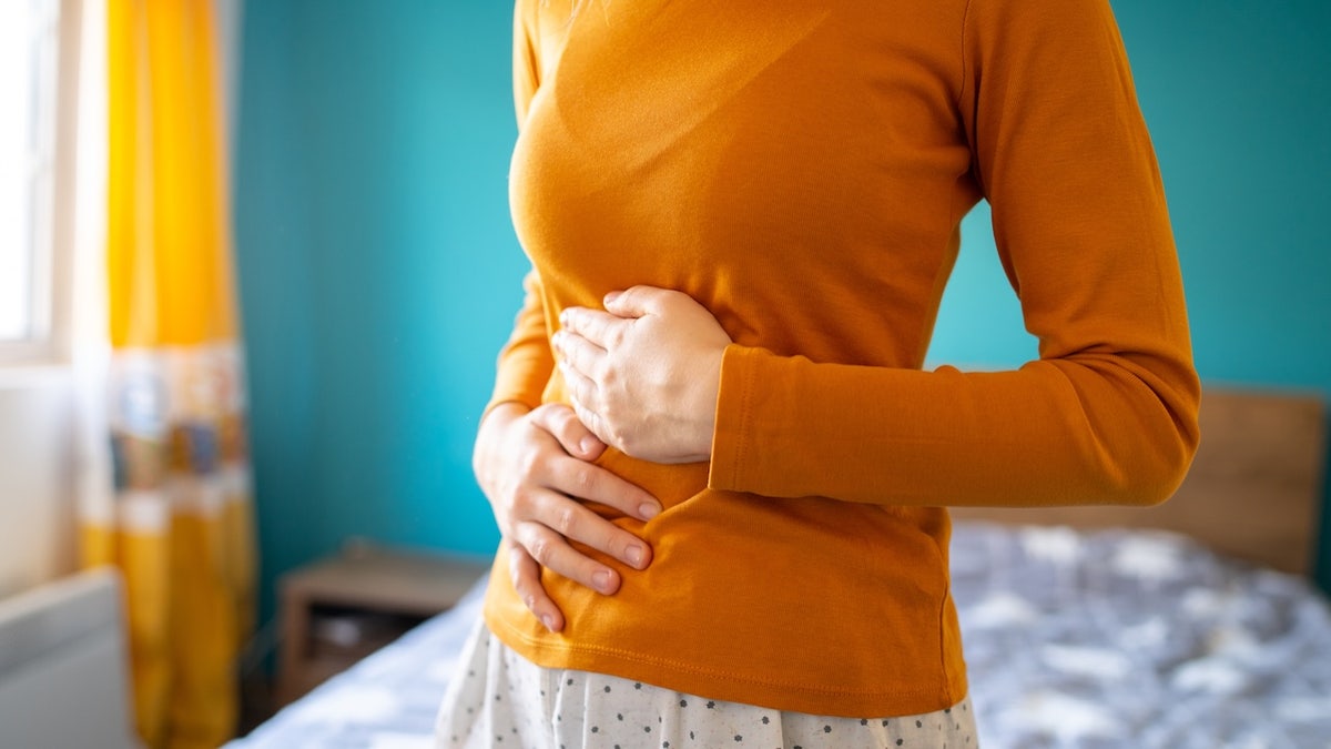Woman with stomach pain