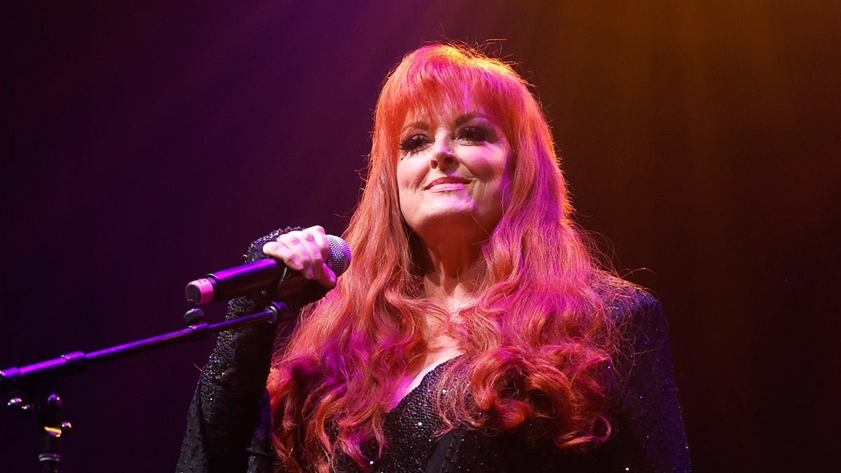 Wynonna Judd performing onstage