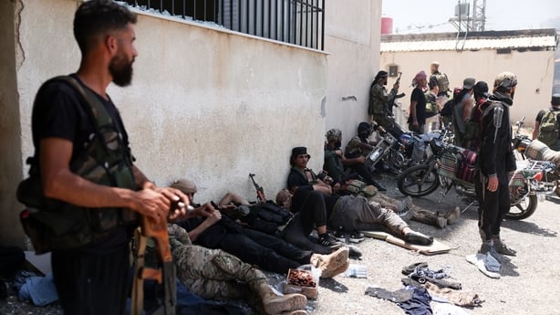 Members of Beduin and tribal forces gather in the city of Sweida in southern Syria