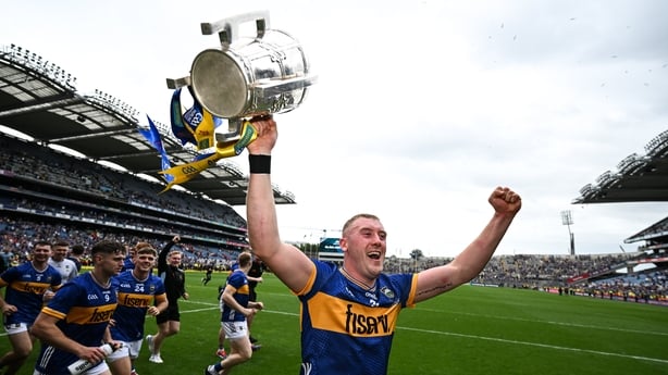 20 July 2025; Eoghan Connolly of Tipperary celebrates with the Liam MacCarthy cup after their side's victory in the GAA Hurling All-Ireland Senior Championship final match between Cork and Tipperary at Croke Park in Dublin. Photo by Stephen McCarthy/Sportsfile