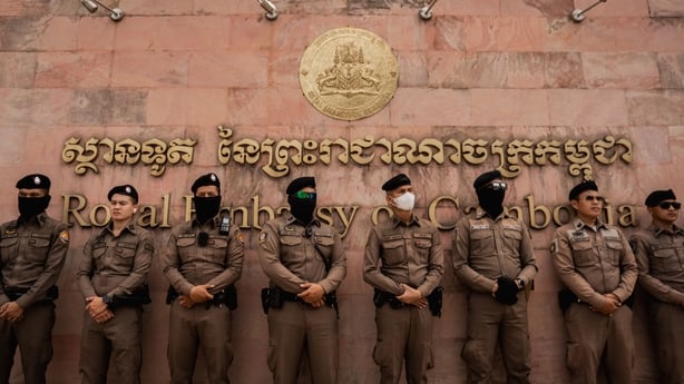 Thai police stand guard outside the Royal Embassy of Cambodia in Bangkok during a demonstration