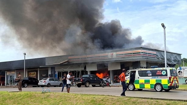 Smoke rises from a petrol station area at Ban Phue, Nong Ya Lat in Thailand after Cambodian artillery struck it