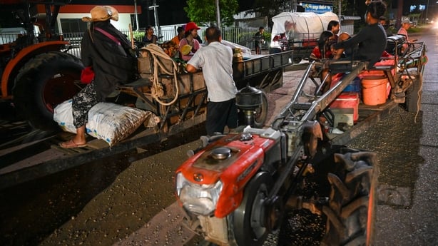 People flee their homes near the Cambodia-Thailand border