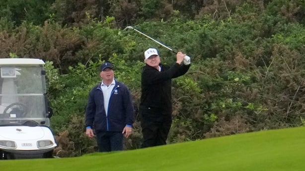 TURNBERRY, SCOTLAND - JULY 26: U.S. President Donald Trump plays golf at Trump Turnberry golf course on July 26, 2026 in Turnberry, Scotland. U.S. President Donald Trump is visiting his Trump Turnberry golf course, as well as Trump International Golf Links in Aberdeenshire, during a brief visit to S