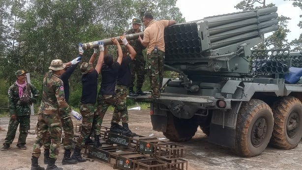 Eight Cambodian soldiers reload the BM-21 multiple rocket launcher in Preah Vihear province