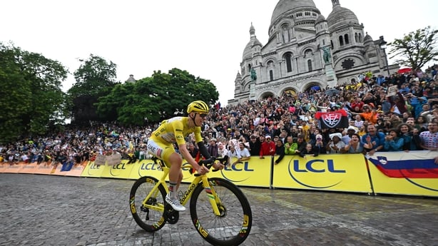 PARIS - CHAMPS-ELYSEES, FRANCE - JULY 27: Tadej Pogacar of Slovenia and UAE Team Emirates - XRG - Yellow leader jersey passing the Cote de la Butte Montmatre close the Basilique du Sacre-Coeur during the 112th Tour de France 2025, Stage 21 a 132.3km stage from Mantes-la-Ville to Paris - Champs-Elyse