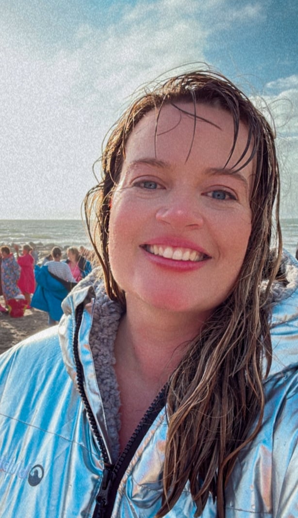 a person smiling at the camera