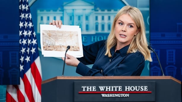 Karoline Leavitt, White House press secretary, displays a rendering of the new White House Ballroom during a news conference in the White House in Washington, DC, US
