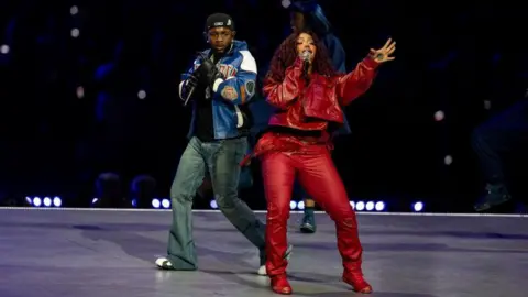 Getty Images Kendrick Lamar and SZA perform together at the 2025 Super Bowl