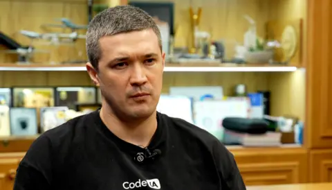 BBC/Xavier Vanpevenaege Mykhailo Fedorov - Digital Transformation Minister, wearing a black top